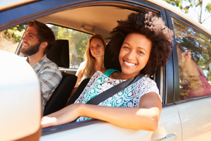 Girl and friends in a new car